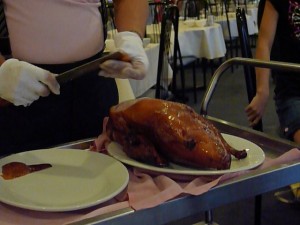 Cutting skin out - peking duck